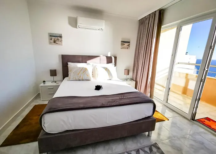 Апартаменти Jardins Gold Vista Mar Портіман